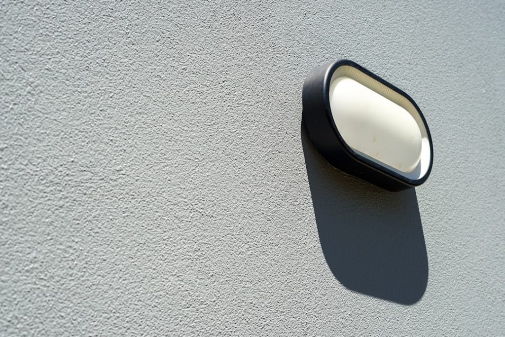 Photo frosted oval wall sconce
